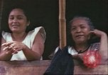 Image of native civilians Pacific Theater, 1944, second 25 stock footage video 65675065672