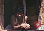 Image of native civilians Pacific Theater, 1944, second 32 stock footage video 65675065672