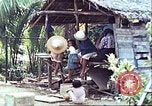 Image of native civilians Pacific Theater, 1944, second 33 stock footage video 65675065672
