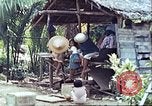 Image of native civilians Pacific Theater, 1944, second 34 stock footage video 65675065672
