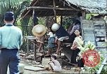 Image of native civilians Pacific Theater, 1944, second 37 stock footage video 65675065672