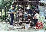 Image of native civilians Pacific Theater, 1944, second 42 stock footage video 65675065672