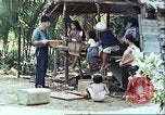 Image of native civilians Pacific Theater, 1944, second 43 stock footage video 65675065672