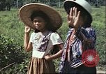 Image of native civilians Pacific Theater, 1944, second 56 stock footage video 65675065672