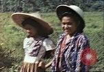 Image of native civilians Pacific Theater, 1944, second 61 stock footage video 65675065672