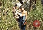Image of native village Pacific Theater, 1944, second 10 stock footage video 65675065674