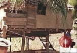 Image of native village Pacific Theater, 1944, second 18 stock footage video 65675065674