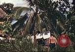 Image of native village Pacific Theater, 1944, second 26 stock footage video 65675065674