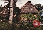 Image of native village Pacific Theater, 1944, second 30 stock footage video 65675065674