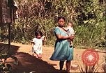 Image of native village Pacific Theater, 1944, second 33 stock footage video 65675065674