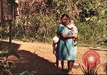 Image of native village Pacific Theater, 1944, second 34 stock footage video 65675065674