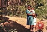 Image of native village Pacific Theater, 1944, second 35 stock footage video 65675065674