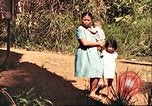 Image of native village Pacific Theater, 1944, second 36 stock footage video 65675065674