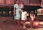 Image of native village Pacific Theater, 1944, second 39 stock footage video 65675065674