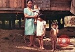 Image of native village Pacific Theater, 1944, second 43 stock footage video 65675065674
