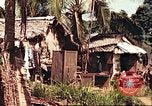 Image of native village Pacific Theater, 1944, second 47 stock footage video 65675065674