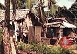 Image of native village Pacific Theater, 1944, second 48 stock footage video 65675065674