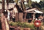 Image of native village Pacific Theater, 1944, second 50 stock footage video 65675065674