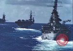 Image of U.S. warships fire at Japanese aircraft Pacific Theater, 1944, second 10 stock footage video 65675065676