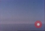 Image of U.S. warships fire at Japanese aircraft Pacific Theater, 1944, second 14 stock footage video 65675065676