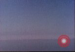 Image of U.S. warships fire at Japanese aircraft Pacific Theater, 1944, second 16 stock footage video 65675065676