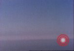 Image of U.S. warships fire at Japanese aircraft Pacific Theater, 1944, second 17 stock footage video 65675065676