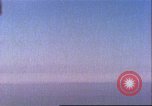 Image of U.S. warships fire at Japanese aircraft Pacific Theater, 1944, second 21 stock footage video 65675065676