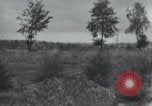 Standbild Memorial US-Kriegsgefangenen ausgeführt durch die Nazis bei Baugnez Malmedy Belgien Baugnez Belgien., 1945, aus Sekunde 10 historischem Filmmaterial Videoclip 65675065707