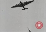 Image of Soviet military aircraft and paratroopers Moscow Russia Soviet Union, 1935, second 20 stock footage video 65675065837