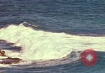 Immagine di Una spiaggia Honolulu Hawaii USA, 1967, secondo 46 filmato di repertorio 65675065910