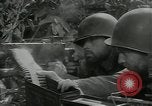 Image of US Army soldiers fire M-1 rifles World War 2 Pearl Harbor Hawaii USA, 1944, second 25 stock footage video 65675065966