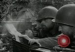 Image of US Army soldiers fire M-1 rifles World War 2 Pearl Harbor Hawaii USA, 1944, second 26 stock footage video 65675065966