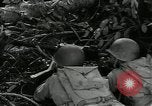 Image of US Army soldiers fire M-1 rifles World War 2 Pearl Harbor Hawaii USA, 1944, second 36 stock footage video 65675065966