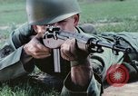 Image of individual camouflage United States USA, 1967, second 21 stock footage video 65675065971