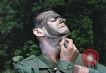 Image of individual camouflage United States USA, 1967, second 24 stock footage video 65675065974