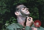 Image of individual camouflage United States USA, 1967, second 25 stock footage video 65675065974