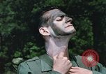 Image of individual camouflage United States USA, 1967, second 27 stock footage video 65675065974