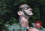 Image of individual camouflage United States USA, 1967, second 32 stock footage video 65675065974