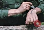 Image of individual camouflage United States USA, 1967, second 38 stock footage video 65675065974