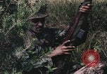 Image of individual camouflage United States USA, 1967, second 14 stock footage video 65675065976