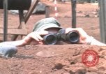 Standbild United States Marine Sniper duty Vietnam Krieg Khe Sanh Vietnam, 1968, aus Sekunde 48 historischem Filmmaterial Videoclip 65675065993