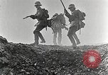 Image of British and French soldier advancing France, 1916, second 60 stock footage video 65675066050