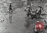 Image of British soldiers in muddy battle in World War 1 France, 1916, second 7 stock footage video 65675066066