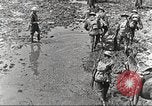 Image of British soldiers in muddy battle in World War 1 France, 1916, second 9 stock footage video 65675066066
