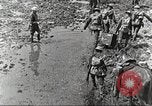 Image of British soldiers in muddy battle in World War 1 France, 1916, second 10 stock footage video 65675066066