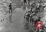 Image of British soldiers in muddy battle in World War 1 France, 1916, second 12 stock footage video 65675066066