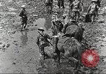 Image of British soldiers in muddy battle in World War 1 France, 1916, second 16 stock footage video 65675066066
