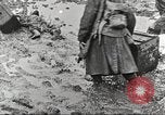 Image of British soldiers in muddy battle in World War 1 France, 1916, second 19 stock footage video 65675066066