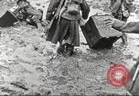 Image of British soldiers in muddy battle in World War 1 France, 1916, second 20 stock footage video 65675066066