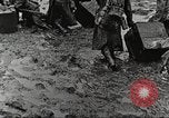 Image of British soldiers in muddy battle in World War 1 France, 1916, second 24 stock footage video 65675066066